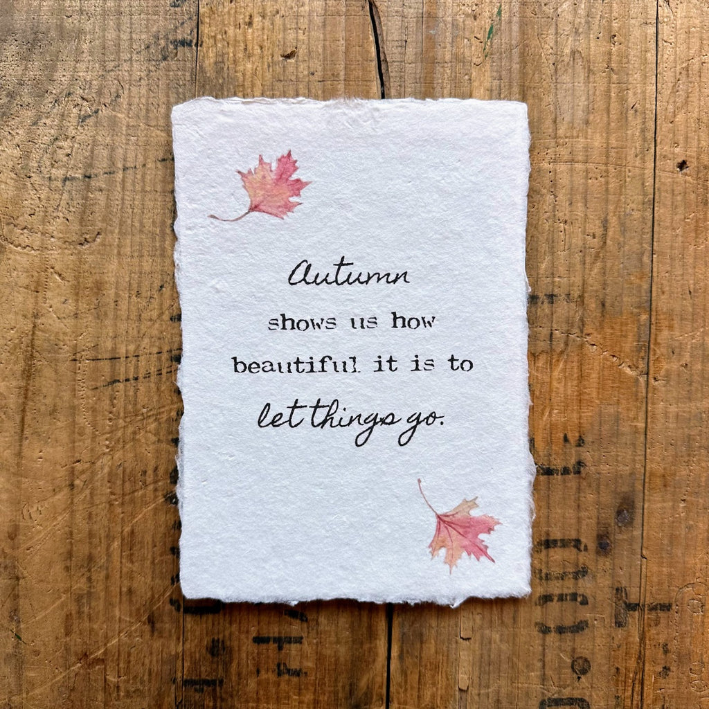 Autumn shows us how beautiful it is to let things go quote on handmade paper