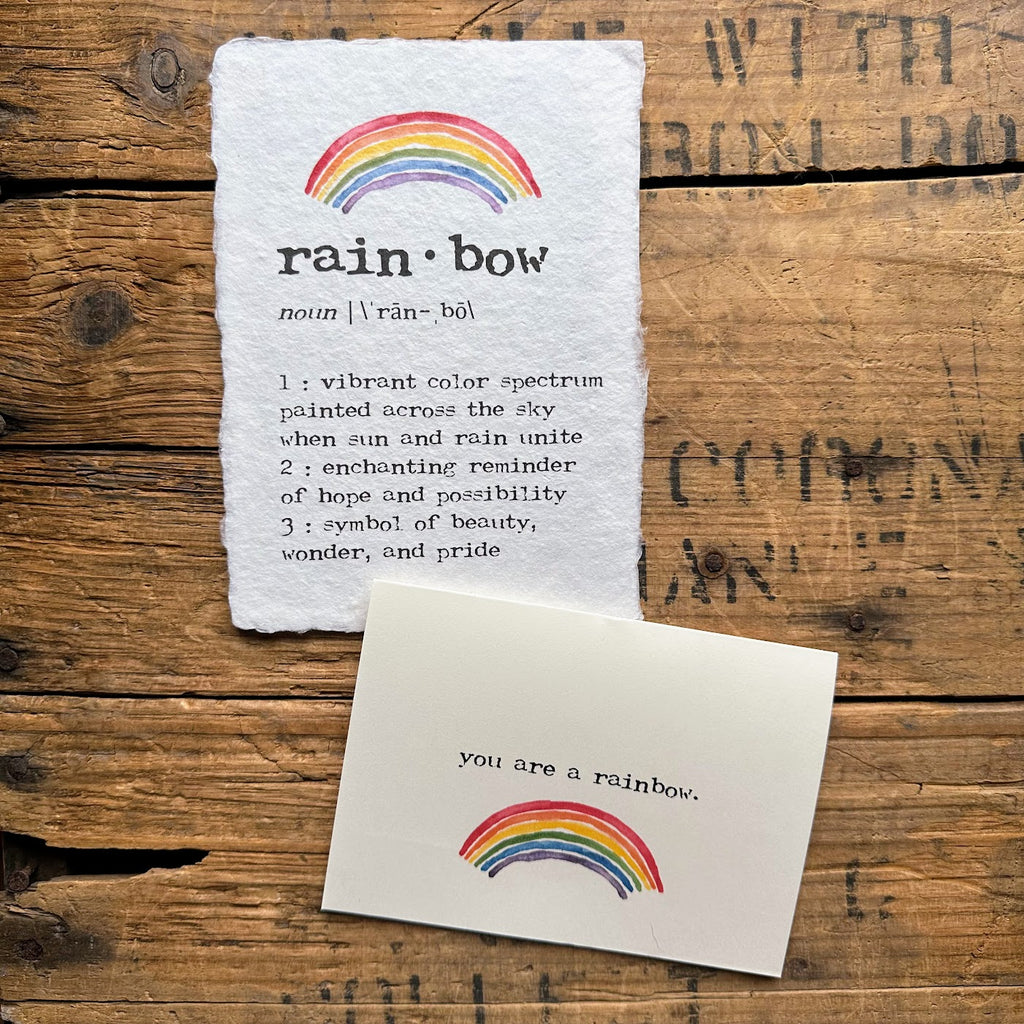 rainbow definition print on handmade cotton rag paper in typewriter font with a watercolor image of a rainbow by artist Patricia Shaw.