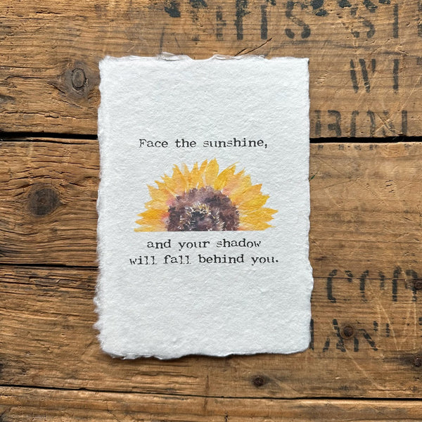 Face the sunshine, and your shadow will fall behind you quote on handmade paper - Alison Rose Vintage