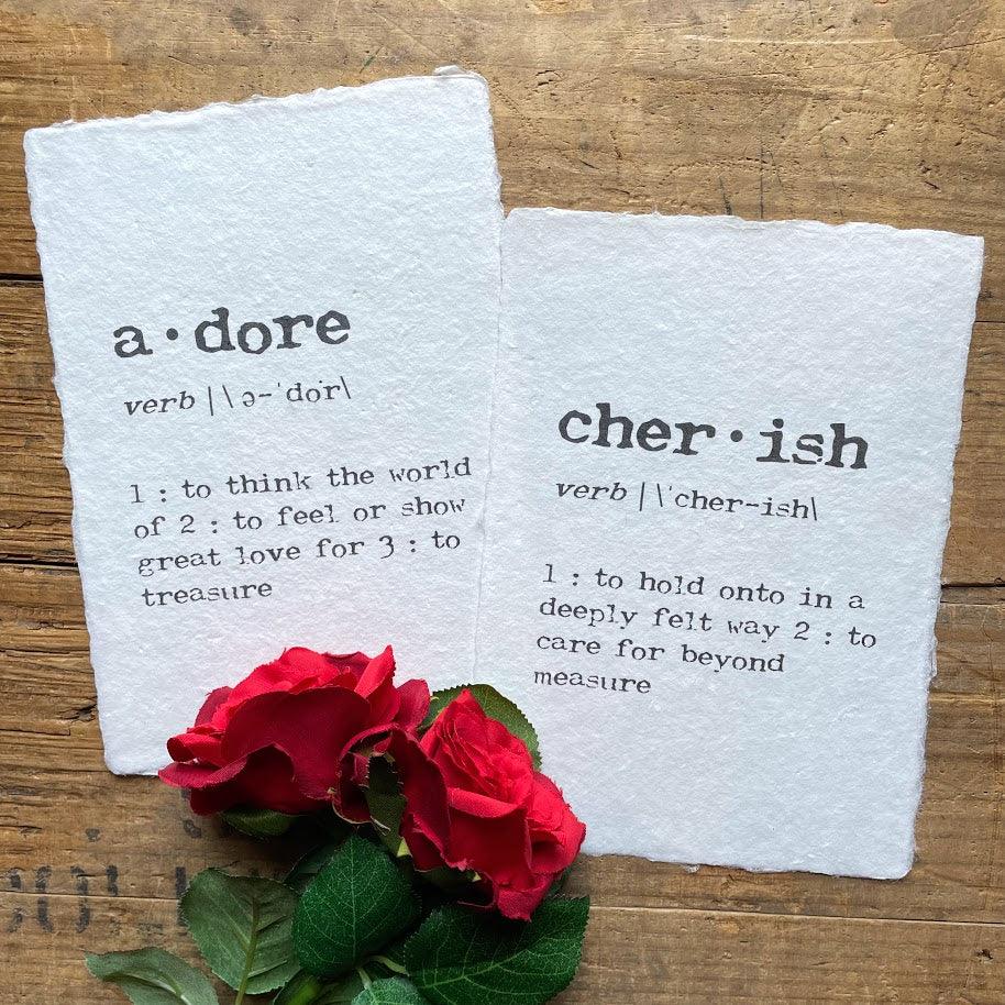 adore and cherish definition prints in typewriter font on handmade cotton rag paper.