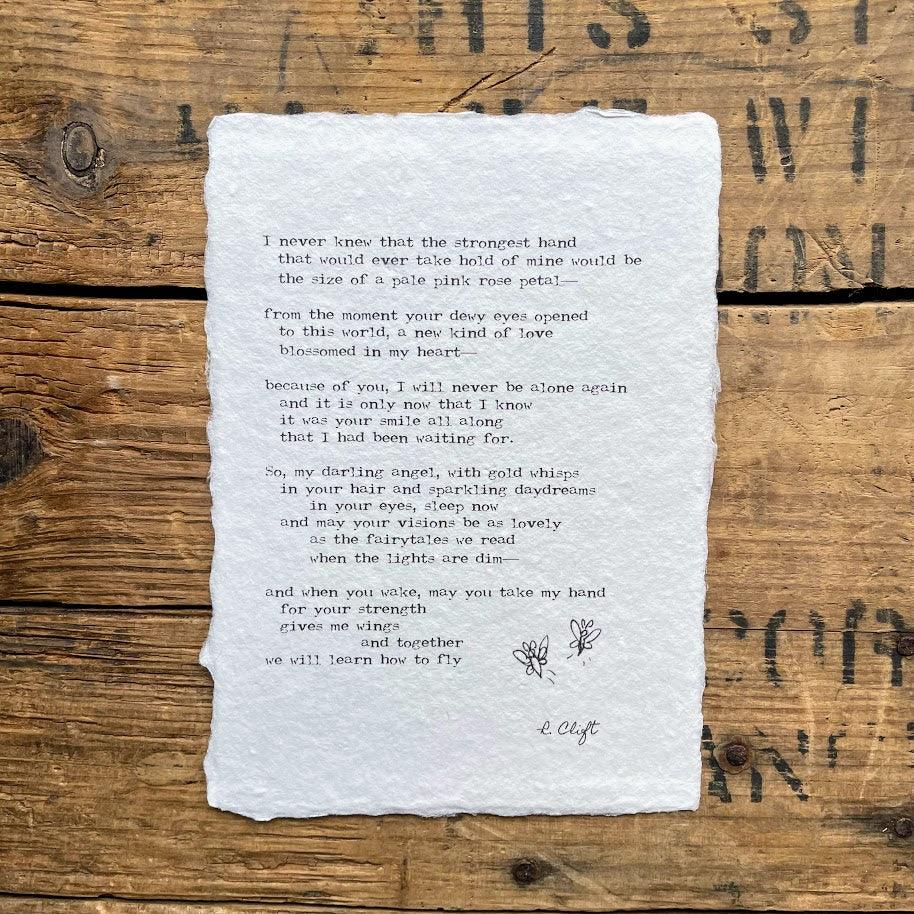 A new kind of love mother and baby poem by R. Clift on handmade paper