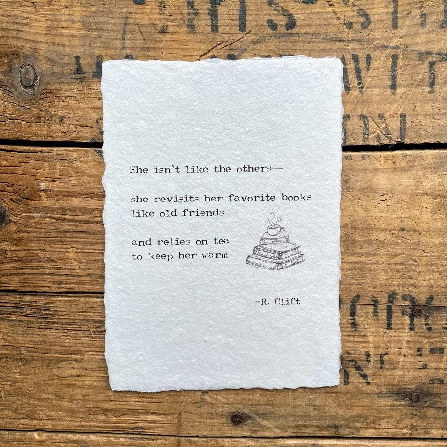 Books and tea poem by R. Clift on handmade paper