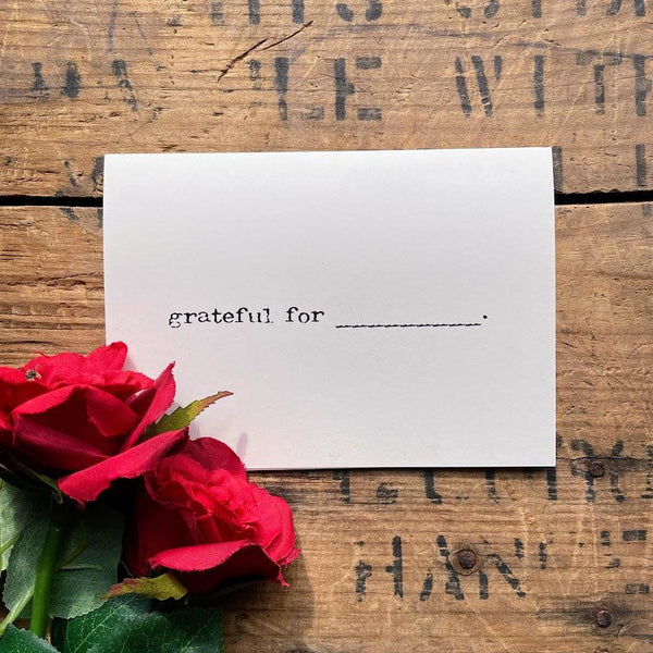 grateful for "blank" greeting card in typewriter font with envelope and rose sticker.