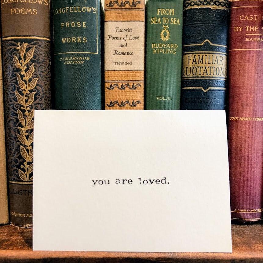 you are loved compliment greeting card in typewriter font with envelope and rose sticker - Alison Rose Vintage