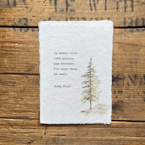 John Muir's "In every walk with nature, one receives far more than he seeks" quote print in typewriter font with original pine tree watercolor image on handmade cotton paper. 