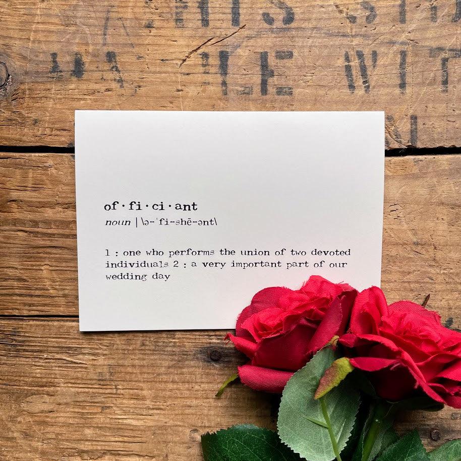 officiant definition greeting card in typewriter font with an envelope and red rose sticker seal.