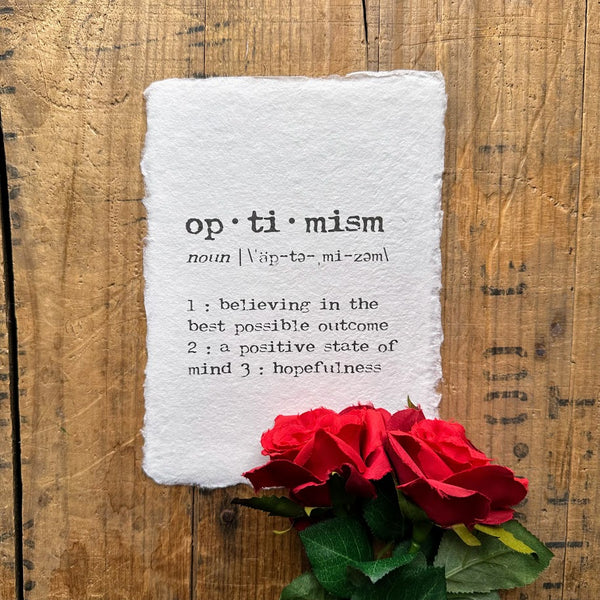 optimism definition print in typewriter font on handmade cotton paper